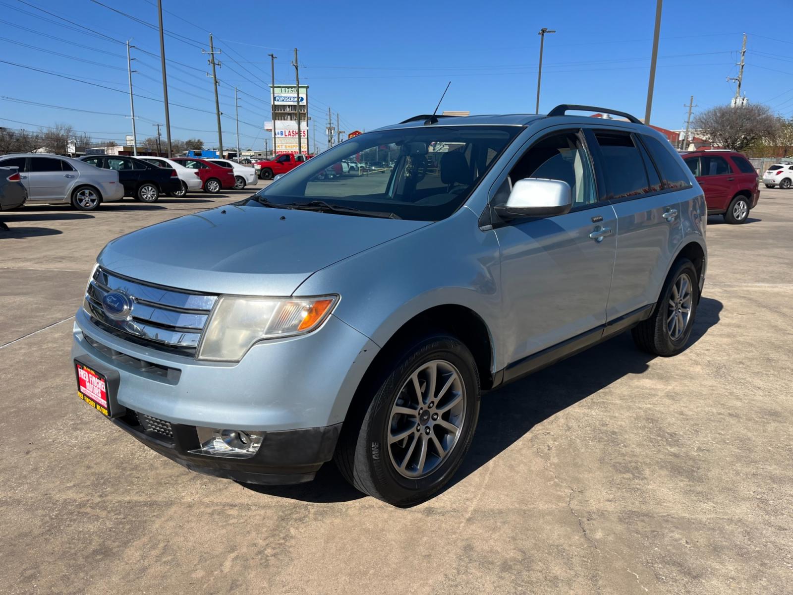 2008 blue /black Ford Edge SEL FWD (2FMDK38C98B) with an 3.5L V6 DOHC 24V engine, 6-Speed Automatic Overdrive transmission, located at 14700 Tomball Parkway 249, Houston, TX, 77086, (281) 444-2200, 29.928619, -95.504074 - Photo #2